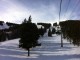 Heading up Rocky Mountain SuperChair A bit more snow under the chair