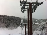 At the top before going over the road